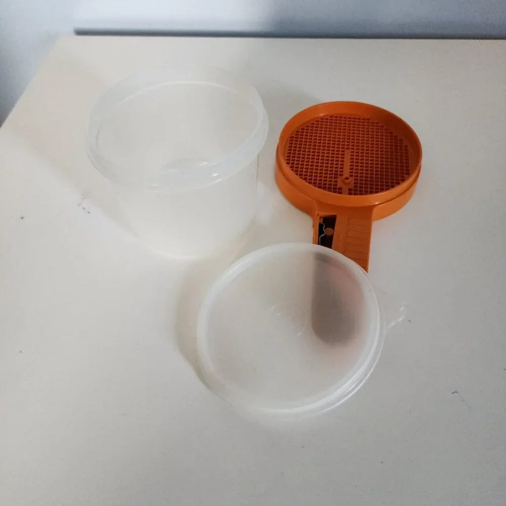 Vintage Tupperware Sift-It hand-held sifter